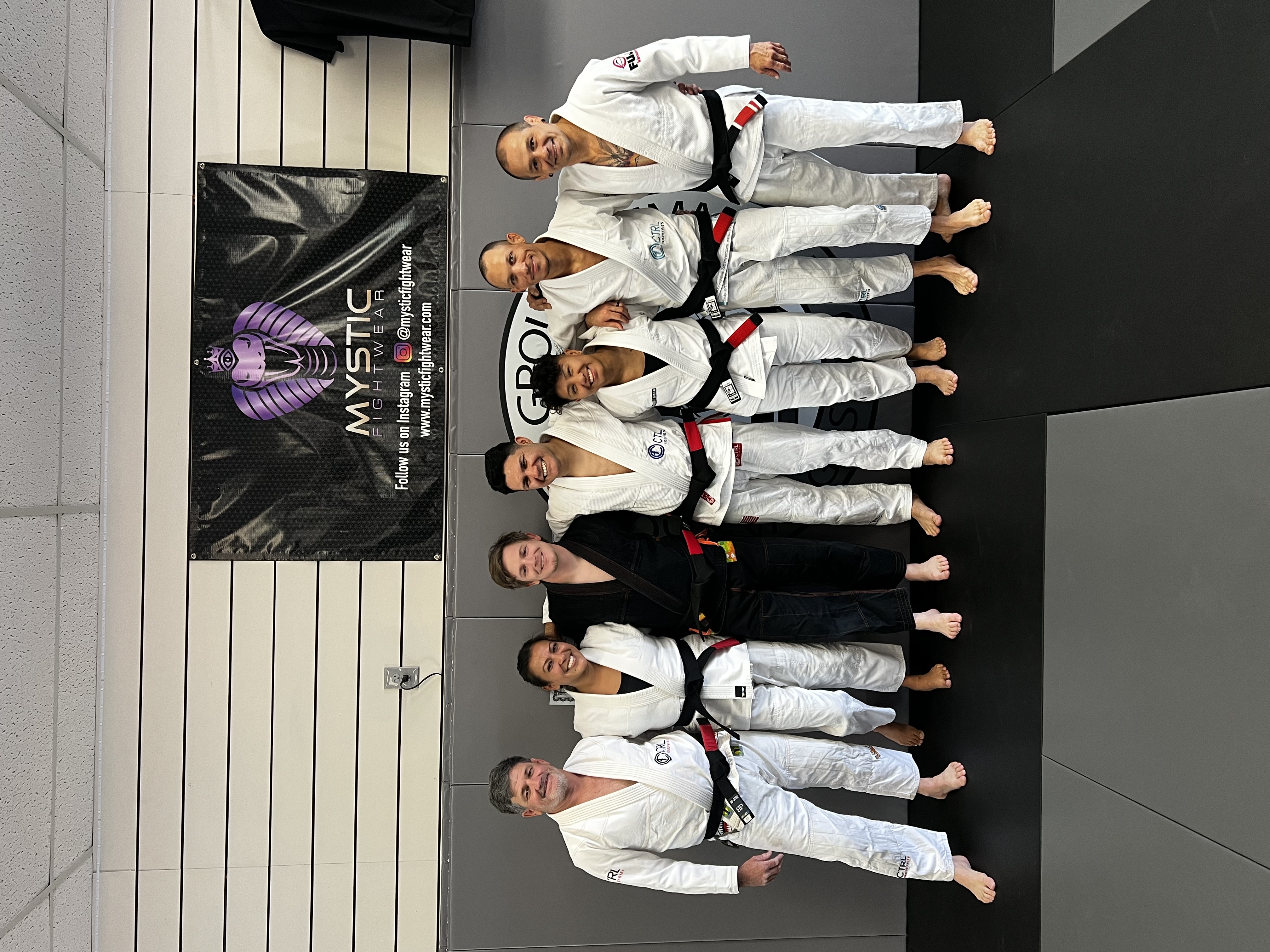 Black belt coaches at Proving Ground MMA